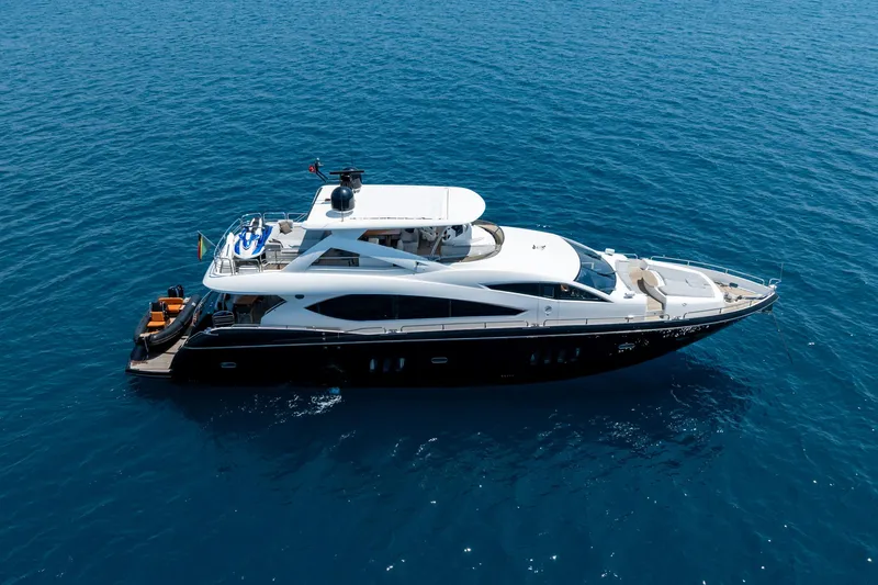 Mello Yacht Photos Pics 2008 Sunseeker 86 Yacht cruising on open blue sea.