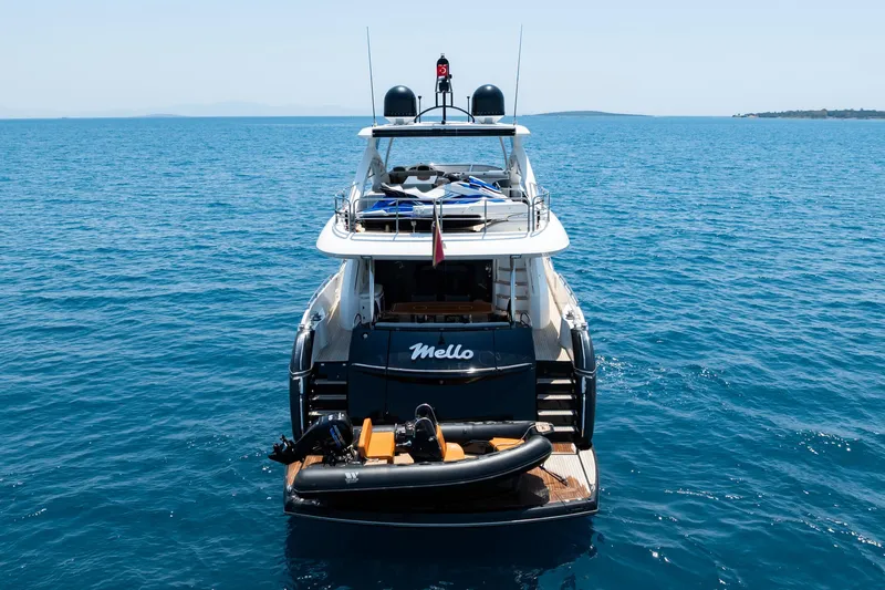 Mello Yacht Photos Pics Sunseeker 86 Yacht 2008 on open sea, rear view with tender boat.