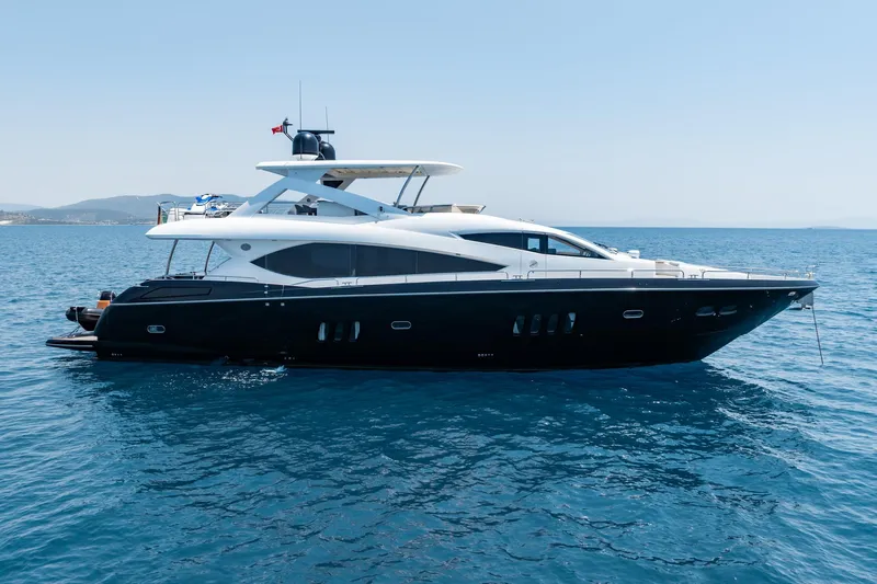 Mello Yacht Photos Pics 2008 Sunseeker 86 Yacht cruising on open sea under clear sky.