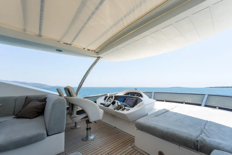 Mello Yacht Photos Pics Luxurious Sunseeker 86 Yacht 2008 helm with plush seating and ocean view.