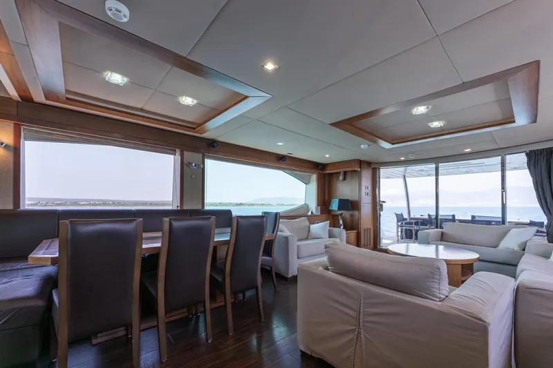 Mello Yacht Photos Pics Luxurious interior of 2008 Sunseeker 86 Yacht with elegant seating and ocean views.