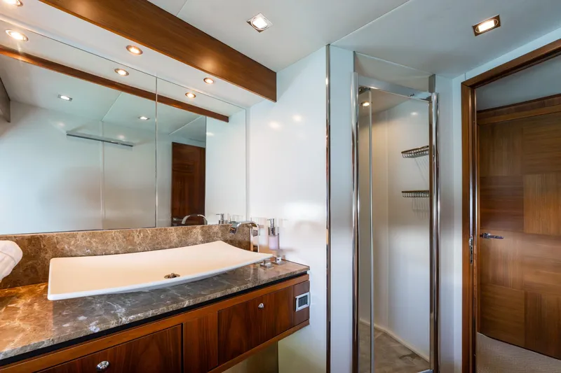 Mello Yacht Photos Pics Luxurious bathroom on 2008 Sunseeker 86 Yacht with modern fixtures and elegant design.