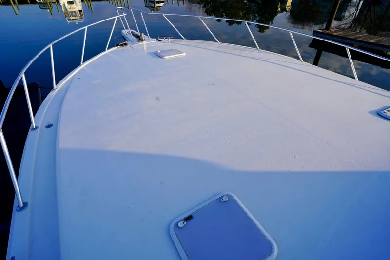 A2z's Yacht Photos Pics Bow view of 1999 Viking 55 Convertible yacht docked at marina.