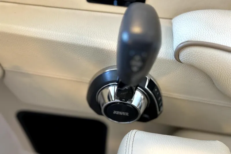  Yacht Photos Pics Close-up of throttle control in 2019 Regal 2800 Bowrider boat cockpit.