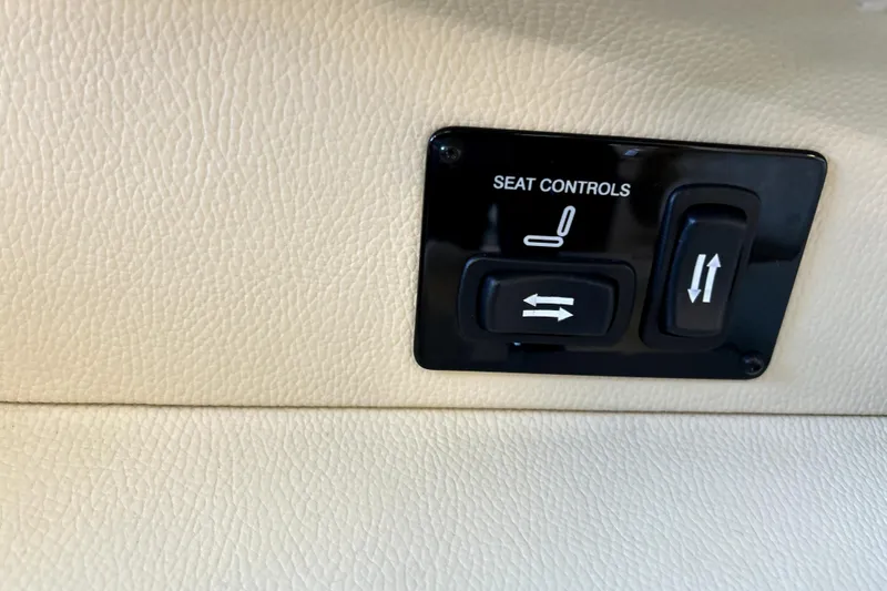  Yacht Photos Pics Seat controls on 2019 Regal 2800 Bowrider, featuring adjustable buttons on beige leather.