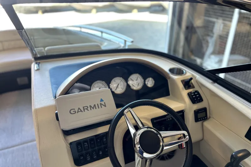  Yacht Photos Pics 2019 Regal 2800 Bowrider dashboard with Garmin navigation system and steering wheel.