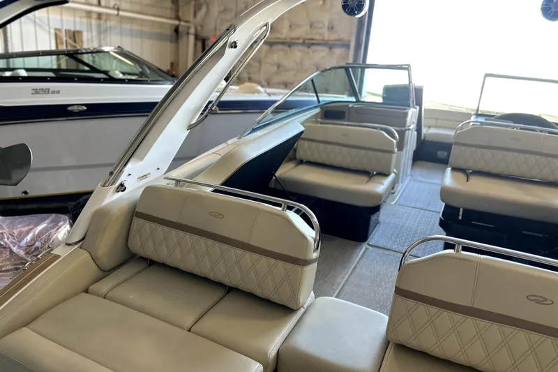  Yacht Photos Pics 2019 Regal 2800 Bowrider interior with beige seating and modern design.