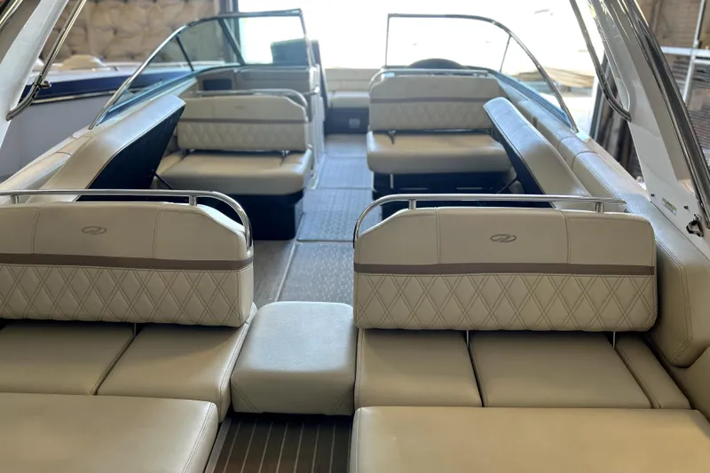  Yacht Photos Pics Luxurious interior of a 2019 Regal 2800 Bowrider boat with plush seating.