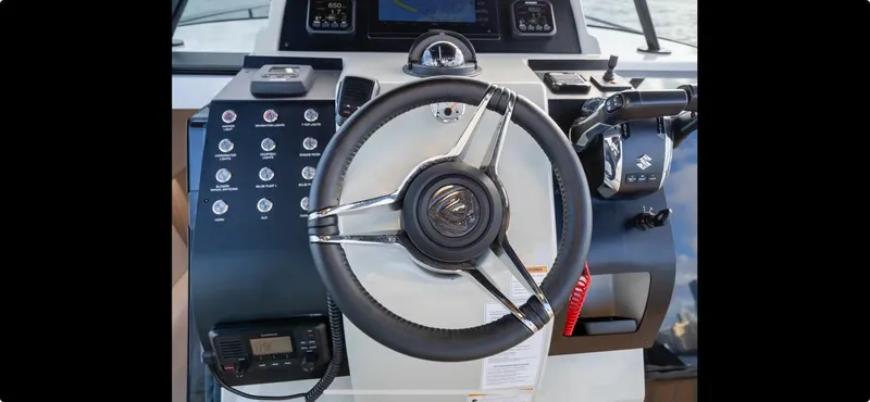  Yacht Photos Pics Steering wheel and controls of 2022 FIM 340 REGINA boat.