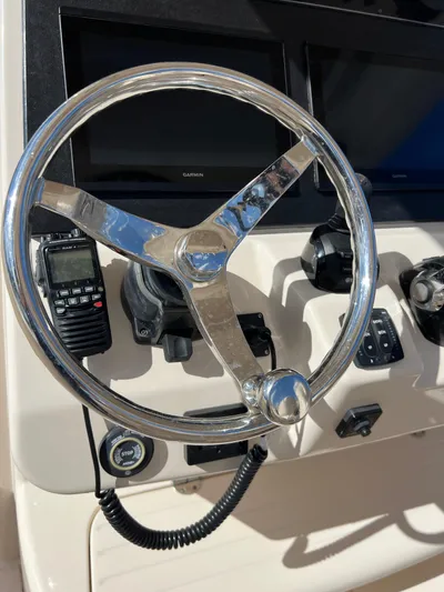 Next Level Yacht Photos Pics Steering wheel and controls of 2019 Grady-White Canyon 306 boat.