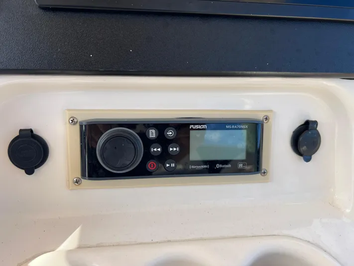 Next Level Yacht Photos Pics Fusion MS-RA70NSX stereo system on 2019 Grady-White Canyon 306 boat dashboard.