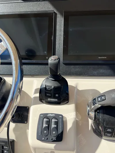 Next Level Yacht Photos Pics Control panel of 2019 Grady-White Canyon 306 boat with Yamaha joystick and Garmin displays.