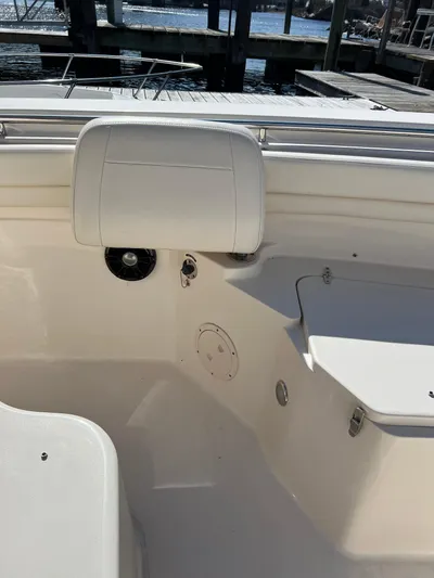 Next Level Yacht Photos Pics 2019 Grady-White Canyon 306 boat interior with seating and dock view.