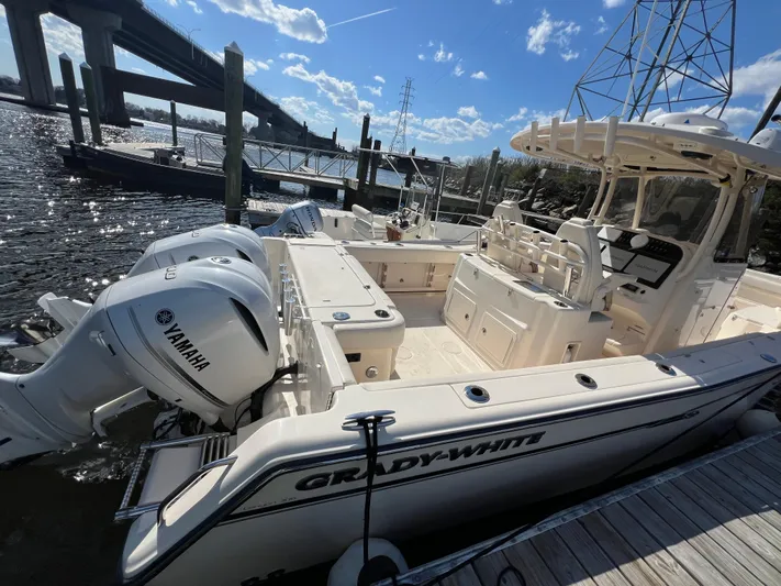 Next Level Yacht Photos Pics 2019 Grady-White Canyon 306 boat docked with twin Yamaha engines.