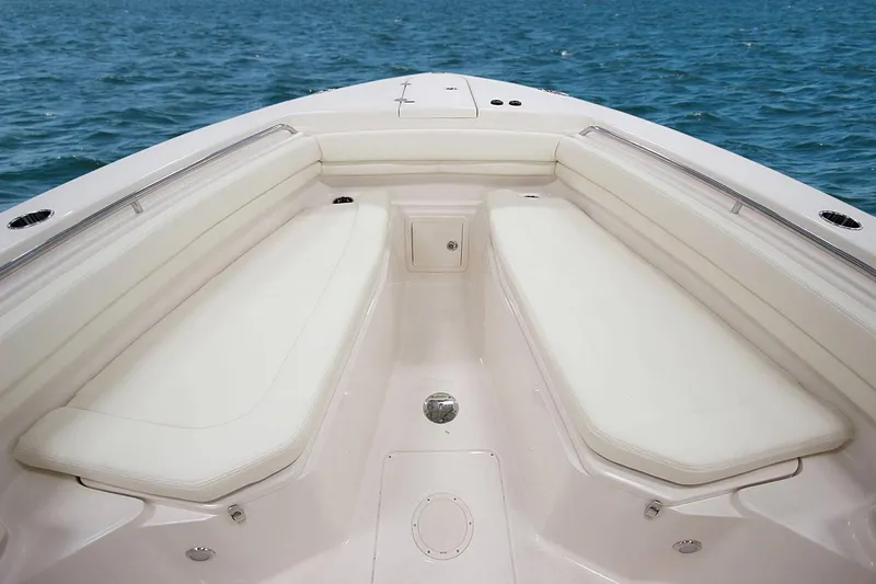 Next Level Yacht Photos Pics 2019 Grady-White Canyon 306 boat interior with cushioned seating, ocean view.