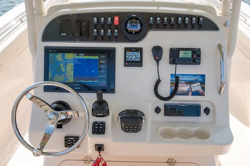 Next Level Yacht Photos Pics Control panel of 2019 Grady-White Canyon 306 boat with navigation and communication equipment.