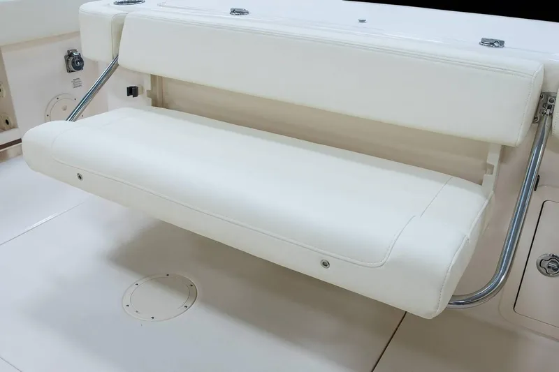 Next Level Yacht Photos Pics 2019 Grady-White Canyon 306 boat with white cushioned seating.