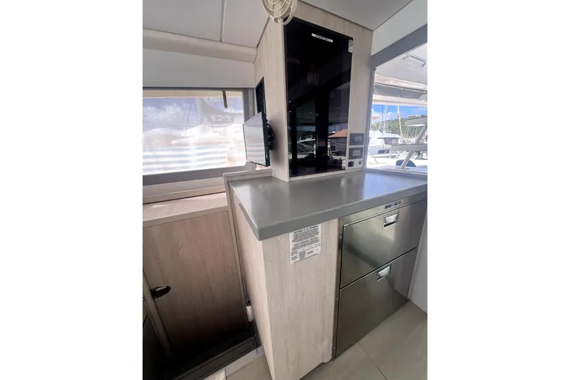 Yacht Photos Pics 2020 Leopard 43 Powercat interior with modern kitchen appliances and sleek design.
