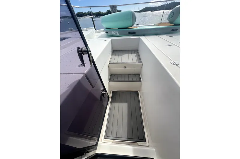  Yacht Photos Pics 2020 Leopard 43 Powercat deck with steps and seating, overlooking serene waters.