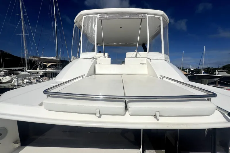  Yacht Photos Pics 2020 Leopard 43 Powercat yacht with spacious deck and sleek design in marina.