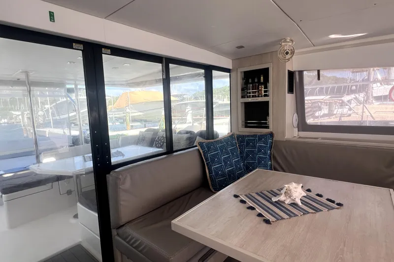  Yacht Photos Pics Interior of 2020 Leopard 43 Powercat with cozy seating and nautical decor.