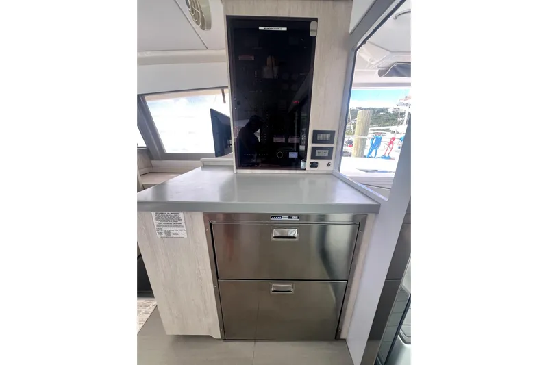  Yacht Photos Pics Modern kitchen area on a 2020 Leopard 43 Powercat yacht with stainless steel appliances.