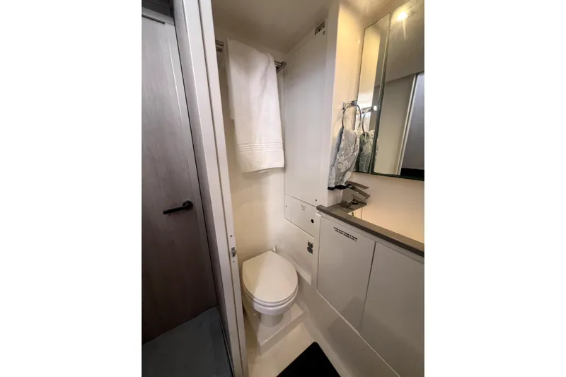  Yacht Photos Pics Bathroom interior of 2020 Leopard 43 Powercat yacht, featuring modern fixtures and elegant design.