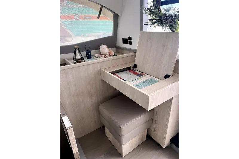  Yacht Photos Pics Interior of 2020 Leopard 43 Powercat with storage compartment and decorative items.