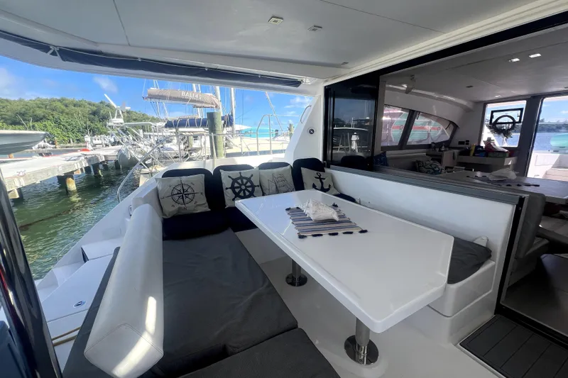  Yacht Photos Pics Luxurious 2020 Leopard 43 Powercat yacht interior with elegant seating and nautical decor.