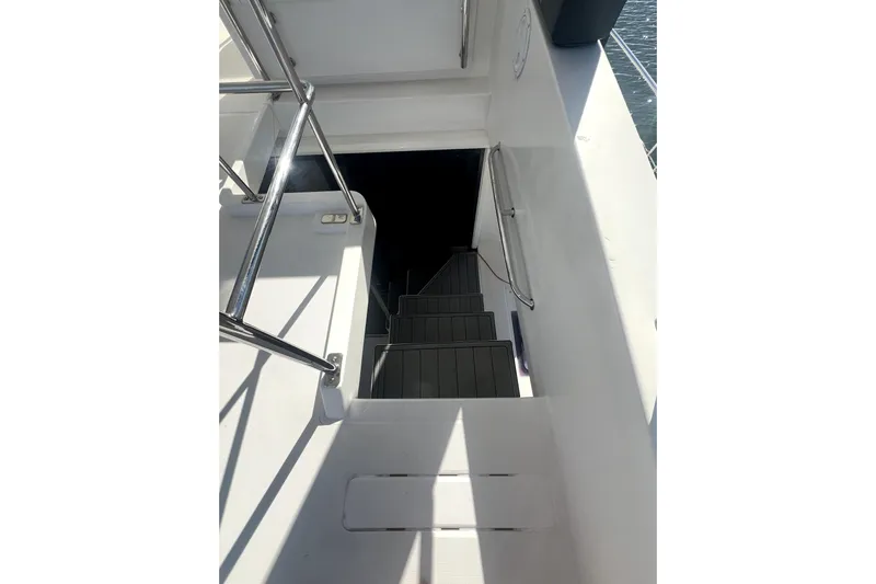  Yacht Photos Pics Staircase leading below deck on 2020 Leopard 43 Powercat yacht.