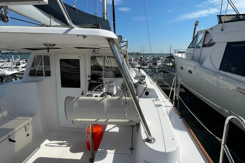  Yacht Photos Pics 2013 Gemini Legacy yacht docked at marina under clear blue sky.
