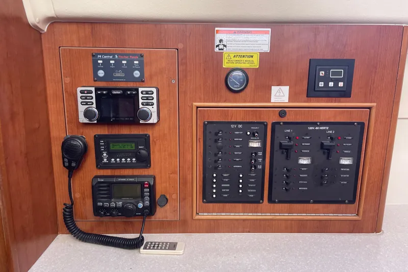  Yacht Photos Pics Control panel of a 2013 Gemini Legacy boat with radio and electrical switches.