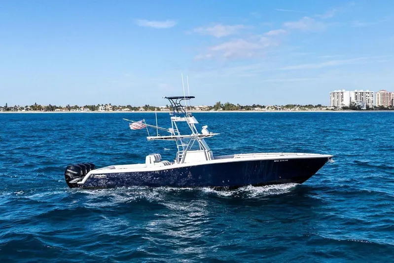  Yacht Photos Pics 2013 Invincible 42 Open Fisherman on open sea.