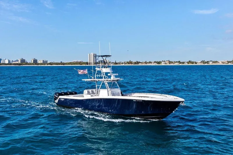 Yacht Photos Pics 2013 Invincible 42 Open Fisherman on open sea.