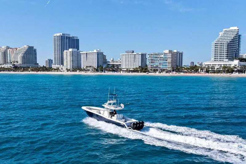  Yacht Photos Pics Invincible 42 Open Fisherman 2013 near coastal city.