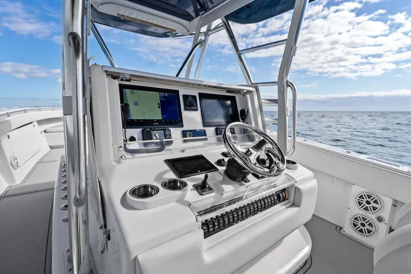  Yacht Photos Pics 2013 Invincible 42 Open Fisherman boat dashboard with ocean view.