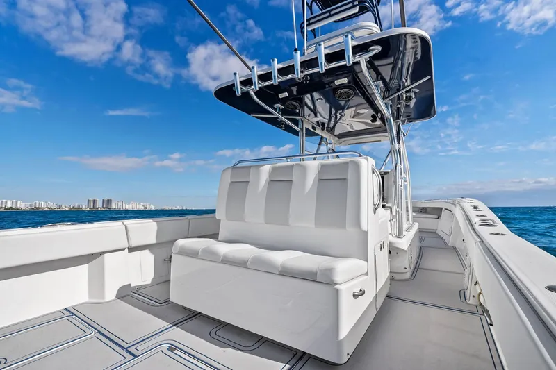  Yacht Photos Pics 2013 Invincible 42 Open Fisherman boat on open water, clear sky background.