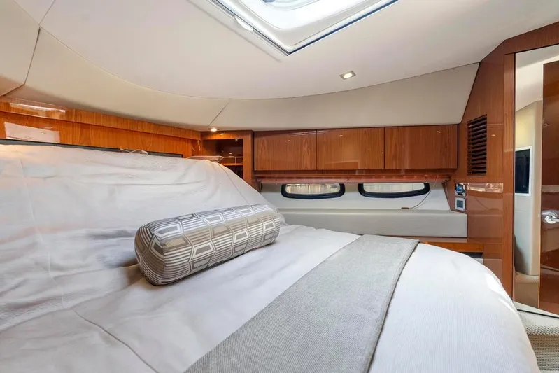 Yacht Photos Pics Luxurious cabin interior of 2015 Sea Ray 510 Sundancer yacht with elegant wood finishes.