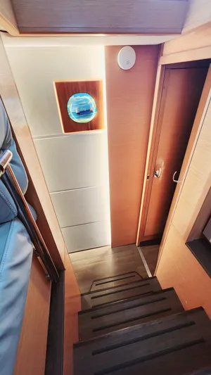 Nauti By Nature Yacht Photos Pics Interior of 2017 Nautitech 46 Fly yacht, featuring wooden stairs and modern design.