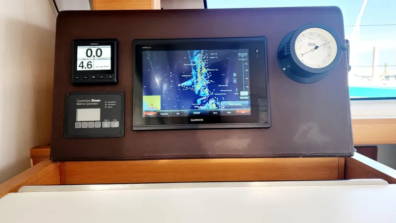 Nauti By Nature Yacht Photos Pics Navigation panel of 2017 Nautitech 46 Fly with Garmin display and marine instruments.