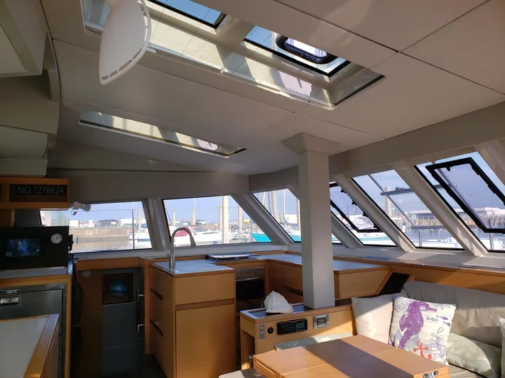 Nauti By Nature Yacht Photos Pics Interior of 2017 Nautitech 46 Fly catamaran with skylights and modern furnishings.