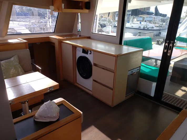 Nauti By Nature Yacht Photos Pics Interior of 2017 Nautitech 46 Fly catamaran with modern kitchen and seating area.