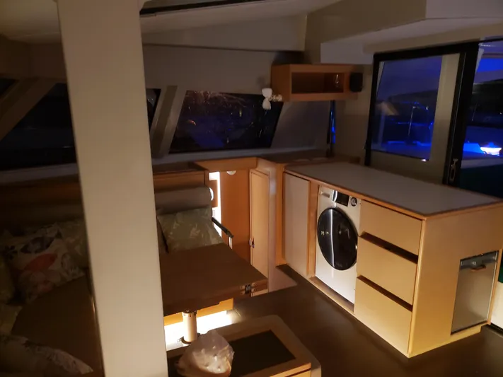 Nauti By Nature Yacht Photos Pics Interior of 2017 Nautitech 46 Fly yacht with modern kitchen and seating area.