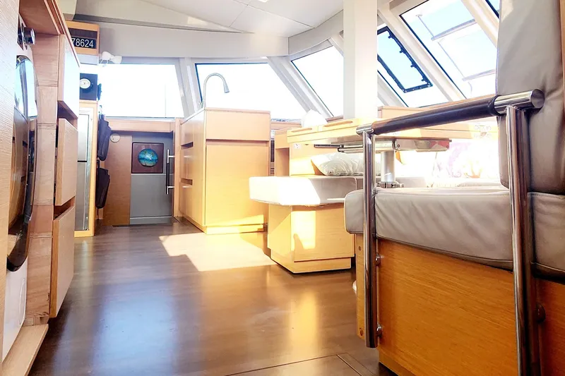 Nauti By Nature Yacht Photos Pics Interior of 2017 Nautitech 46 Fly catamaran, featuring modern wood finishes and ample natural light.