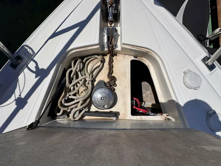  Yacht Photos Pics Anchor and rope storage on 2002 Cruisers Yachts 4450 Express Motor Yacht.