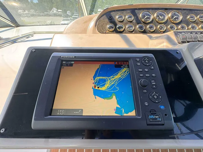  Yacht Photos Pics Navigation system on 2002 Cruisers Yachts 4450 Express Motor Yacht dashboard.