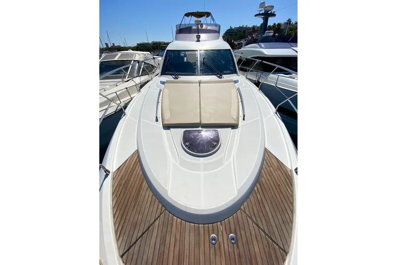  Yacht Photos Pics 2011 Beneteau Monte Carlo 47 Fly yacht with sun deck and wooden flooring.