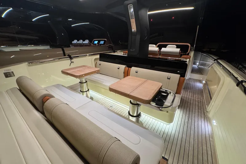  Yacht Photos Pics Luxurious interior of 2024 Invictus TT460 yacht with elegant seating and modern design.