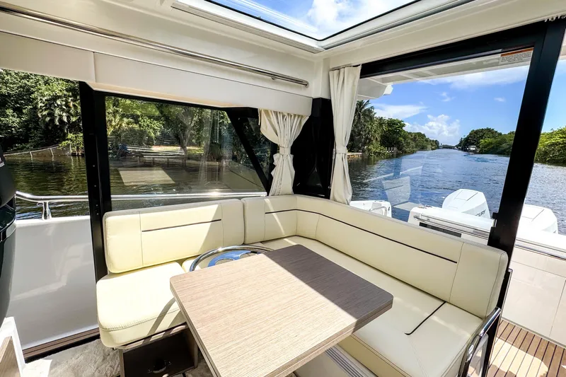  Yacht Photos Pics Interior of 2025 Wellcraft 38 Explorer yacht with scenic river view.