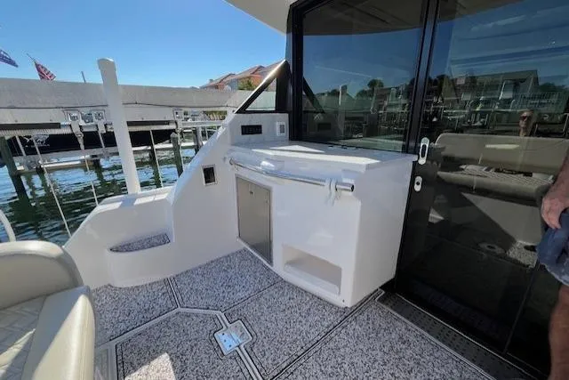  Yacht Photos Pics 2022 Regal 38 XO yacht deck with sleek design and modern amenities.